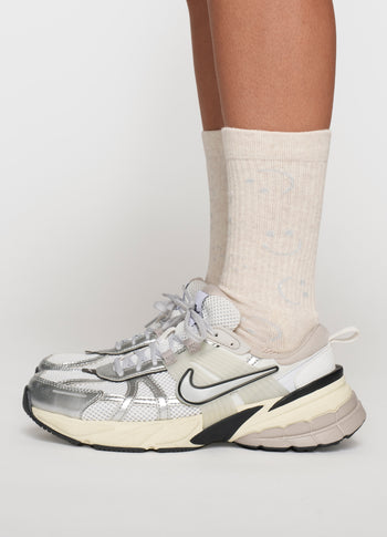 socks all-over smile | soft white melee