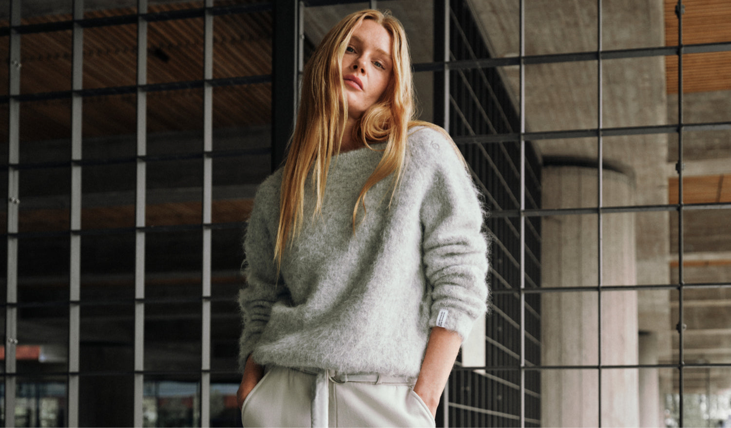 Shop the soft timeless knit sweater in light grey melee for women