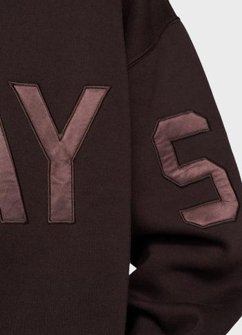 statement sweater logo | deep wine