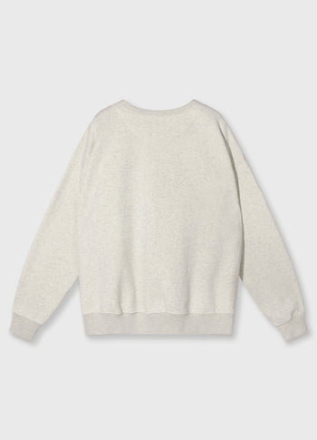 statement sweater logo patch | soft white melee