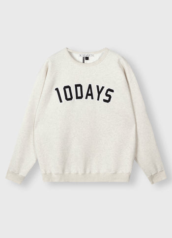 THE STATEMENT SWEATER | soft white melee