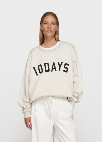 THE STATEMENT SWEATER | soft white melee