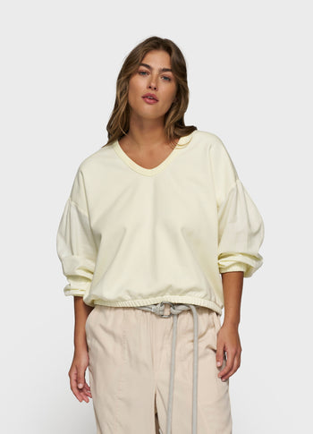 puffed sleeve sweater | faded pastel yellow