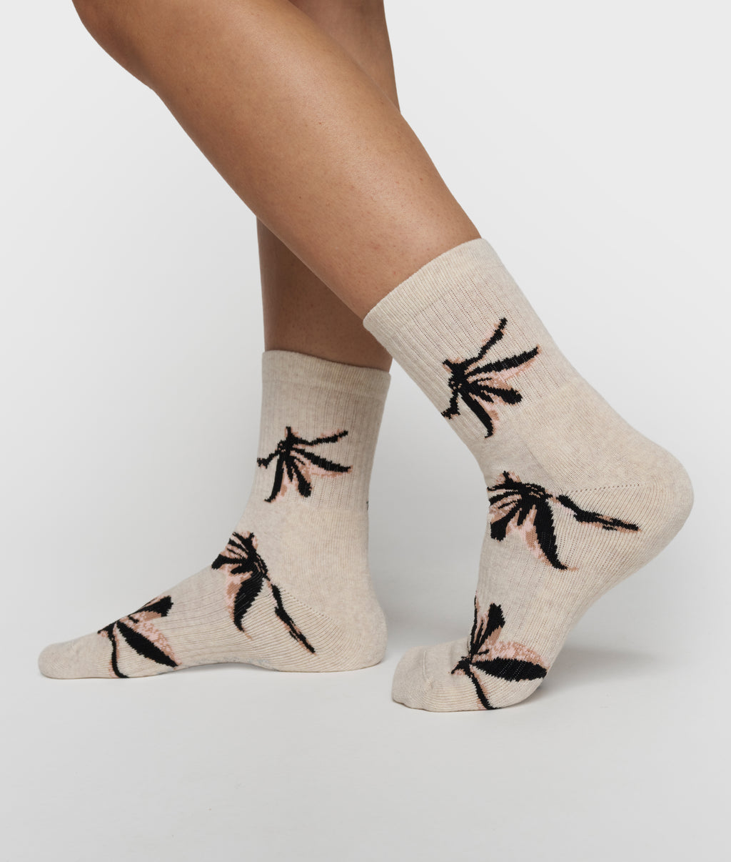 socks all-over flower | soft white melee