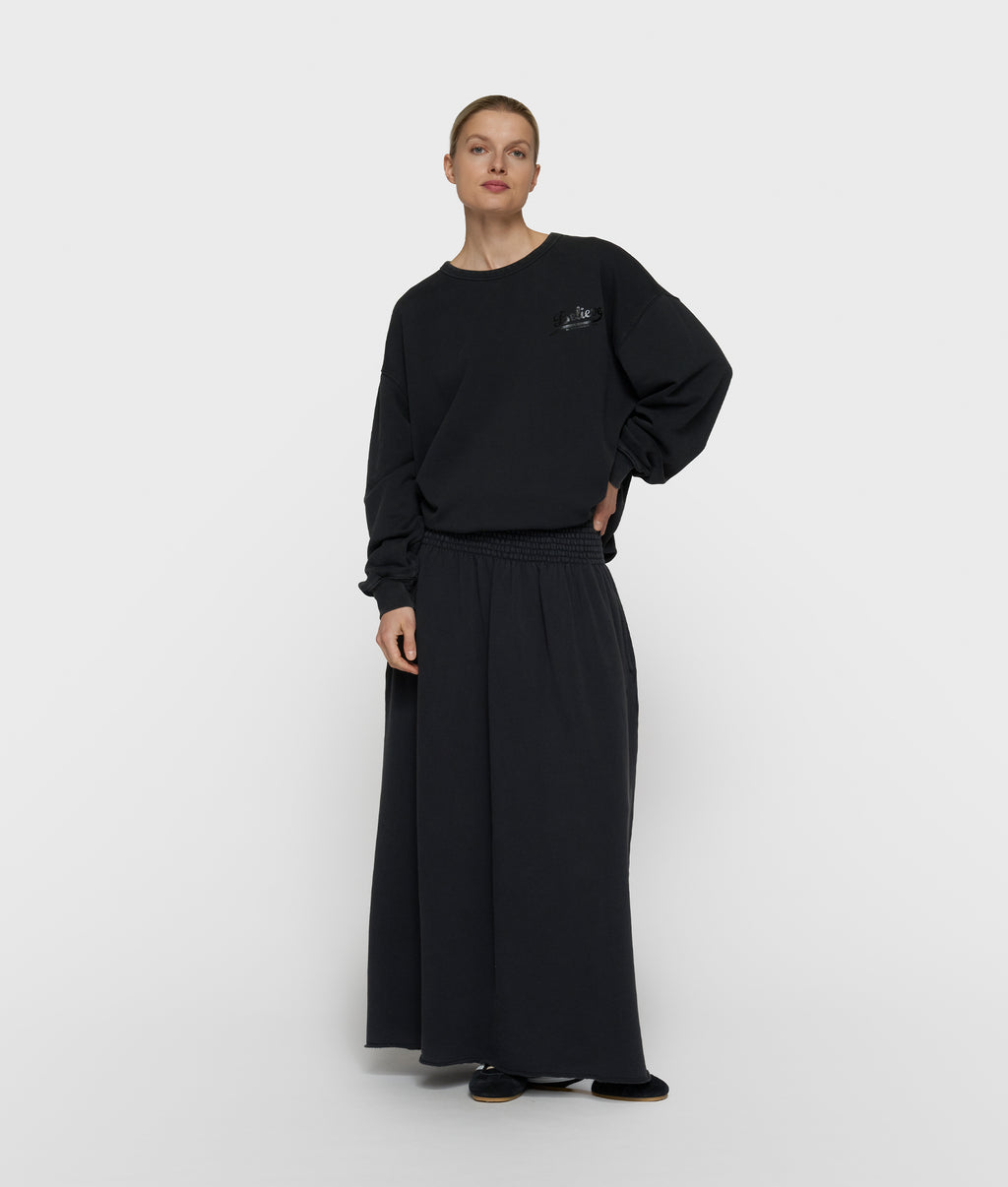 statement sweater believe | dark charcoal