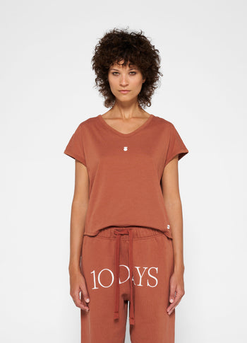 tee medal | saddle brown