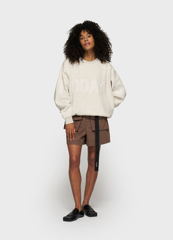 statement sweater logo patch | soft white melee