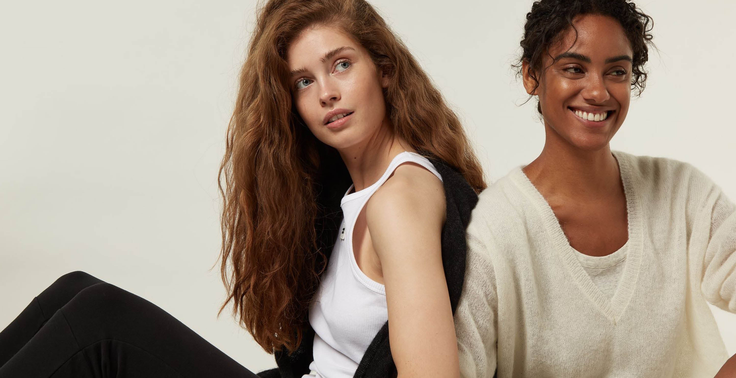 white rib tank top and knitted soft white V-neck sweater