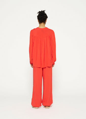 flowy pleated blouse | poppy red