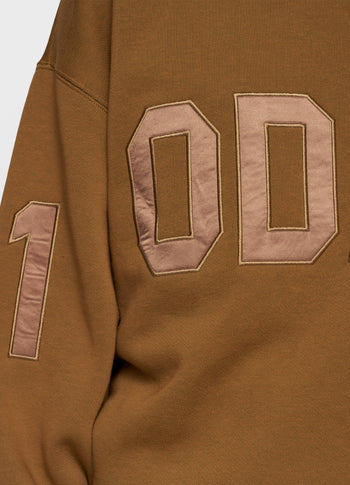 statement sweater logo | suede