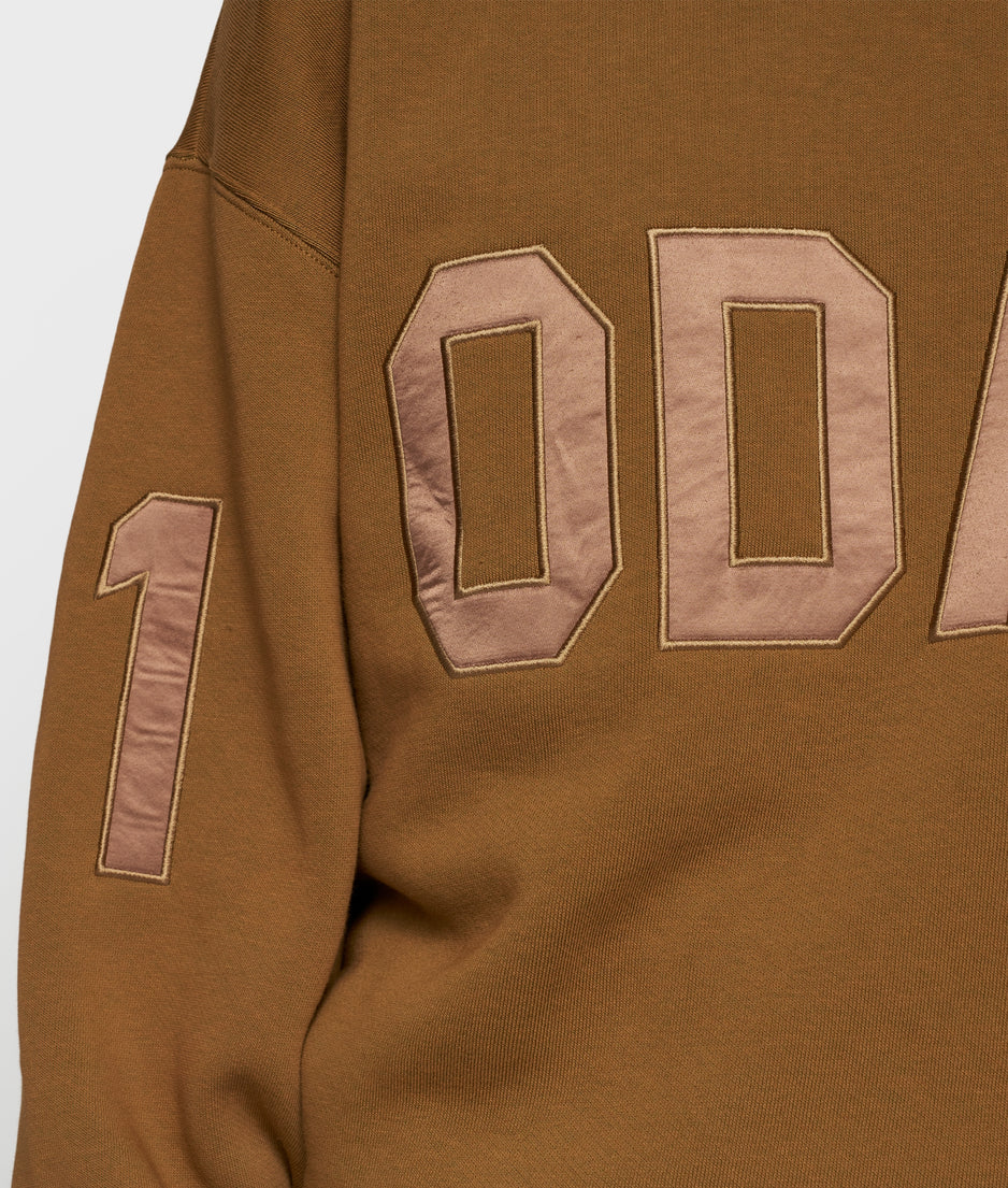 statement sweater logo | suede