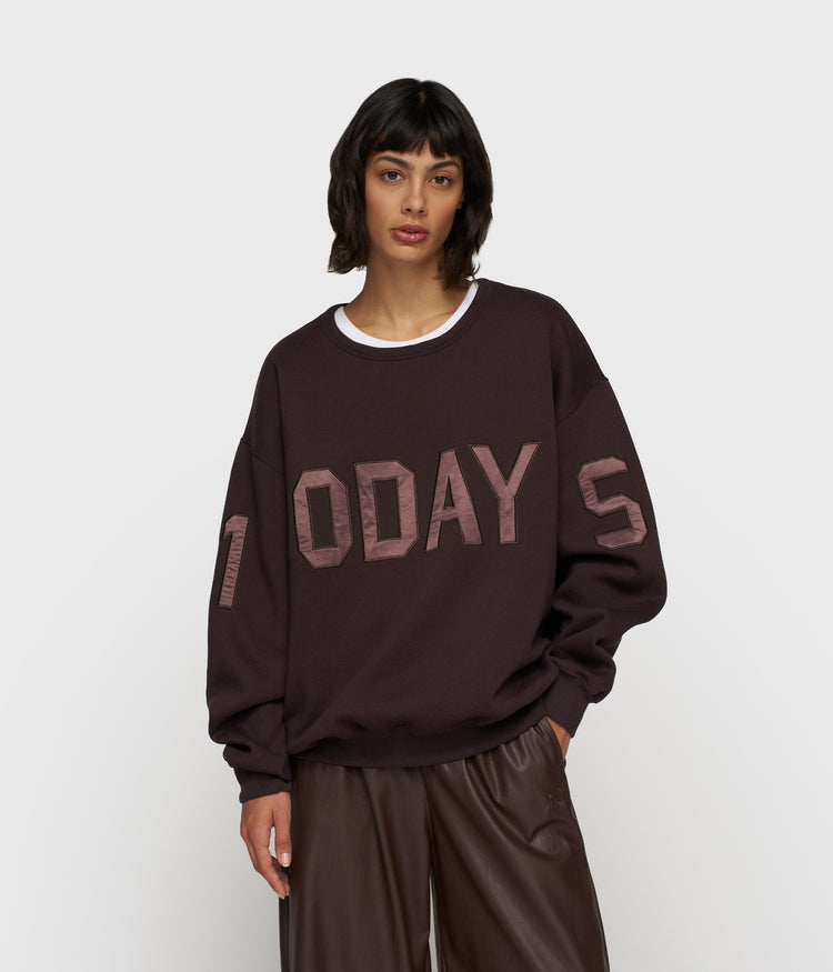 statement sweater logo | deep wine
