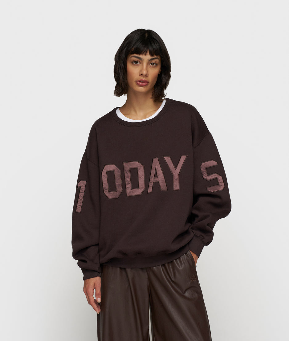 statement sweater logo | deep wine