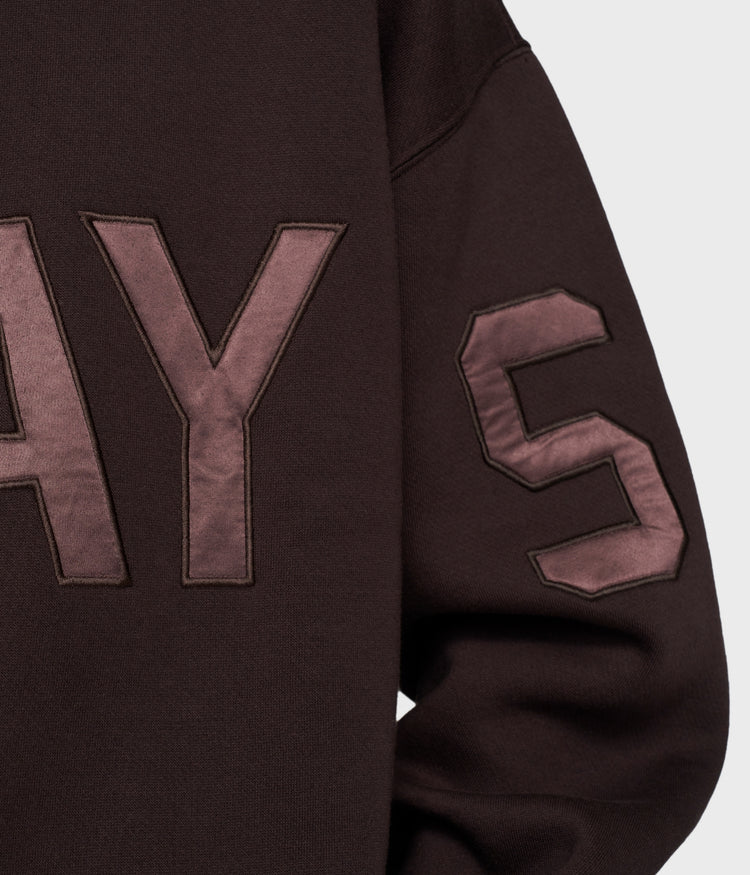 statement sweater logo | deep wine