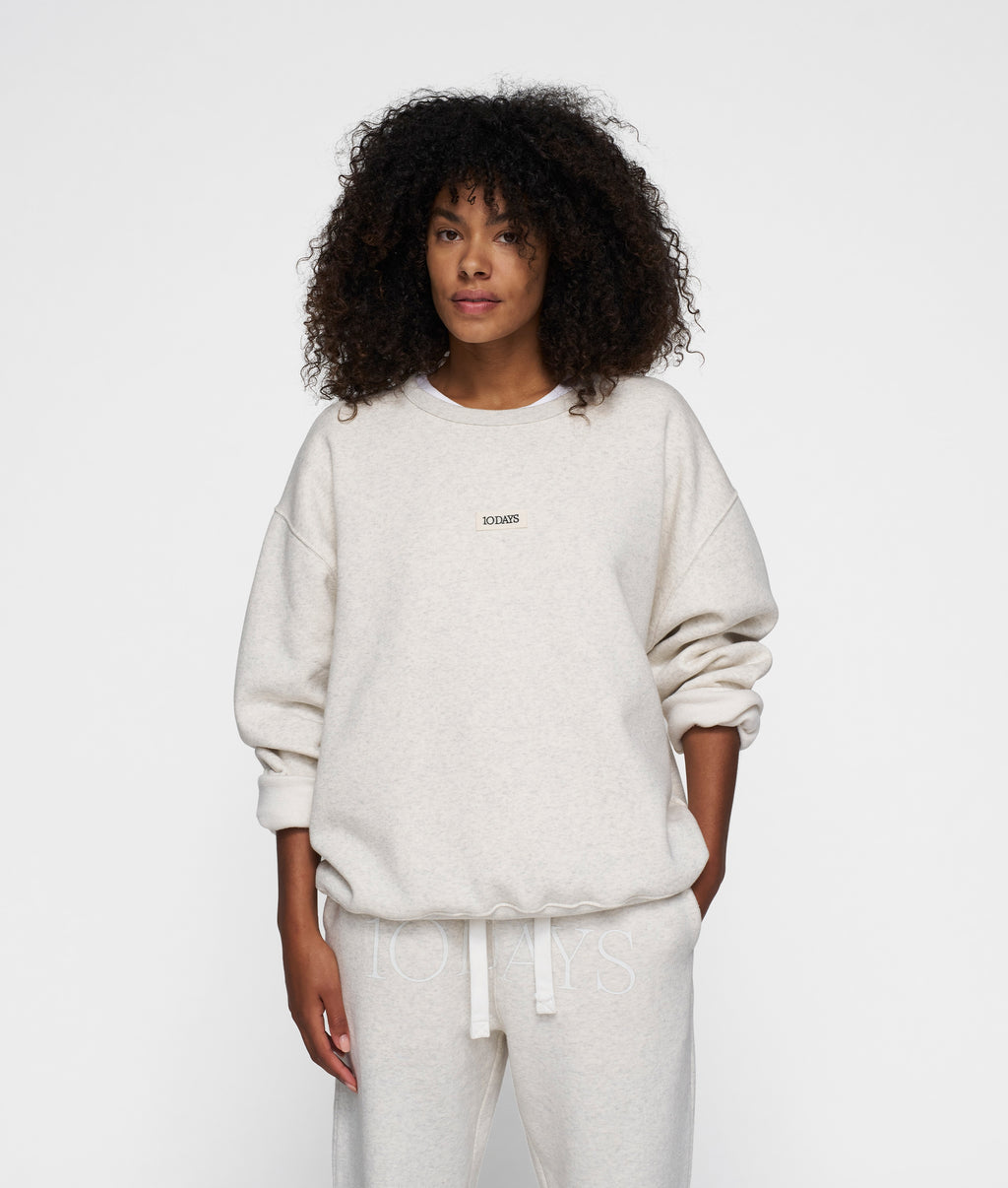 THE CLEAN STATEMENT SWEATER | soft white melee | 10DAYS | Official
