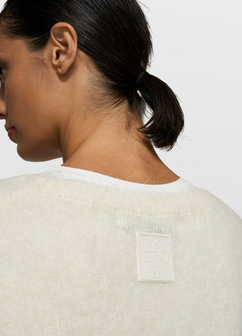 sleeveless knit sweater | ecru