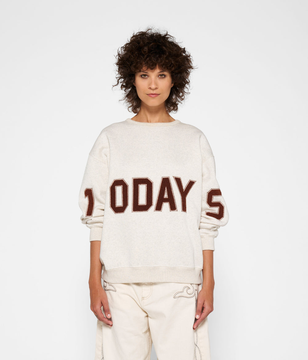 statement sweater logo | soft white melee