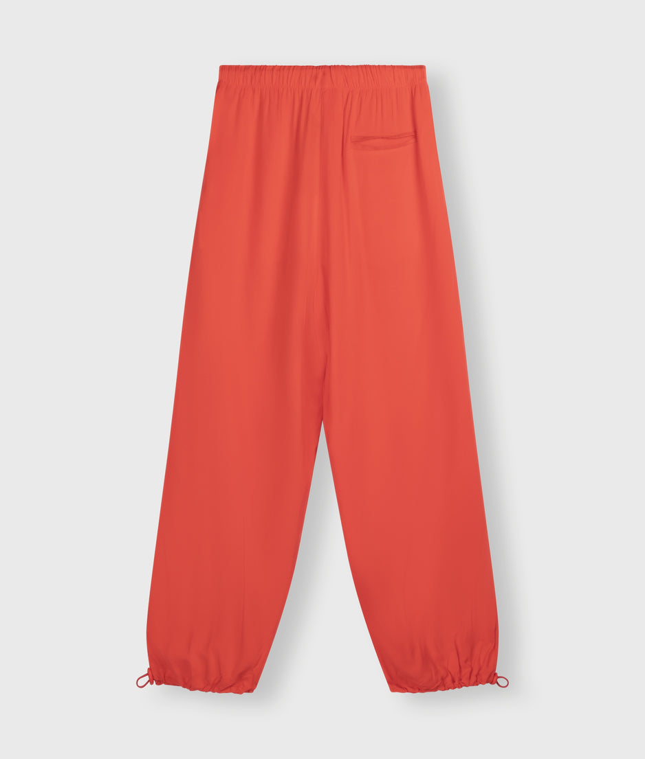 parachute pants | poppy red