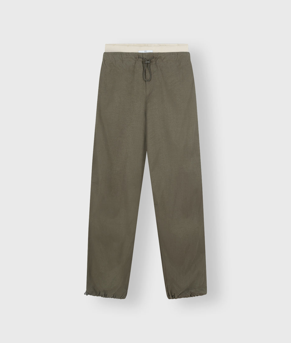 parachute pants | dark moss