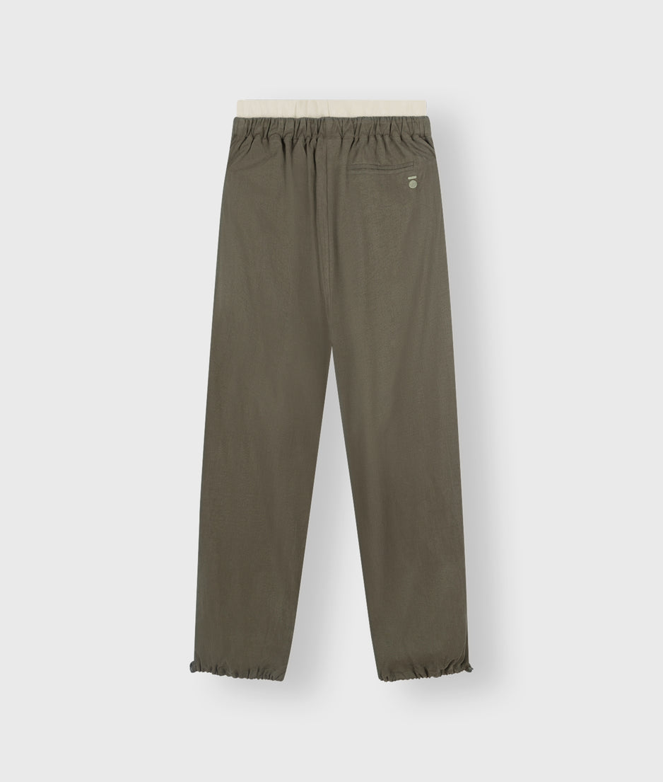 parachute pants | dark moss