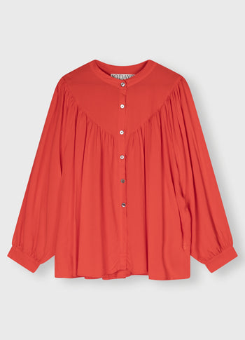 flowy pleated blouse | poppy red