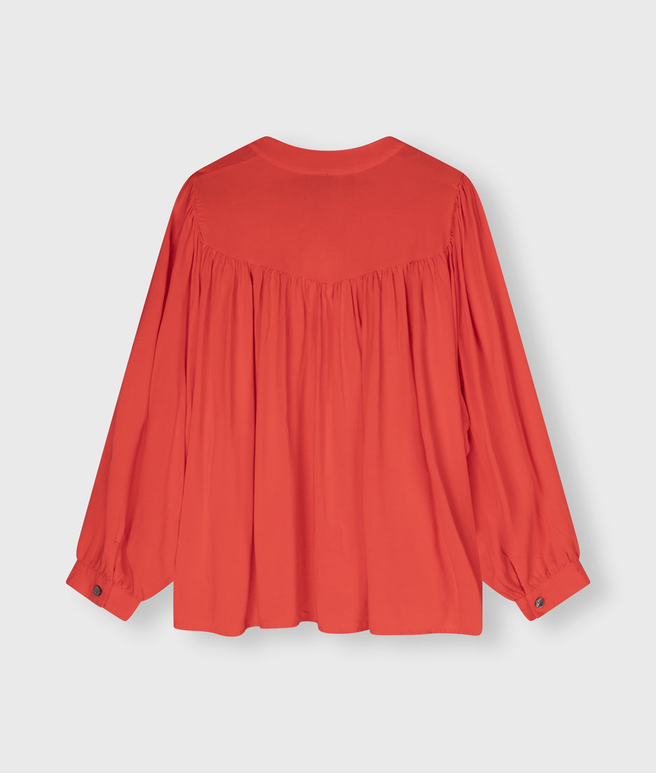 flowy pleated blouse | poppy red