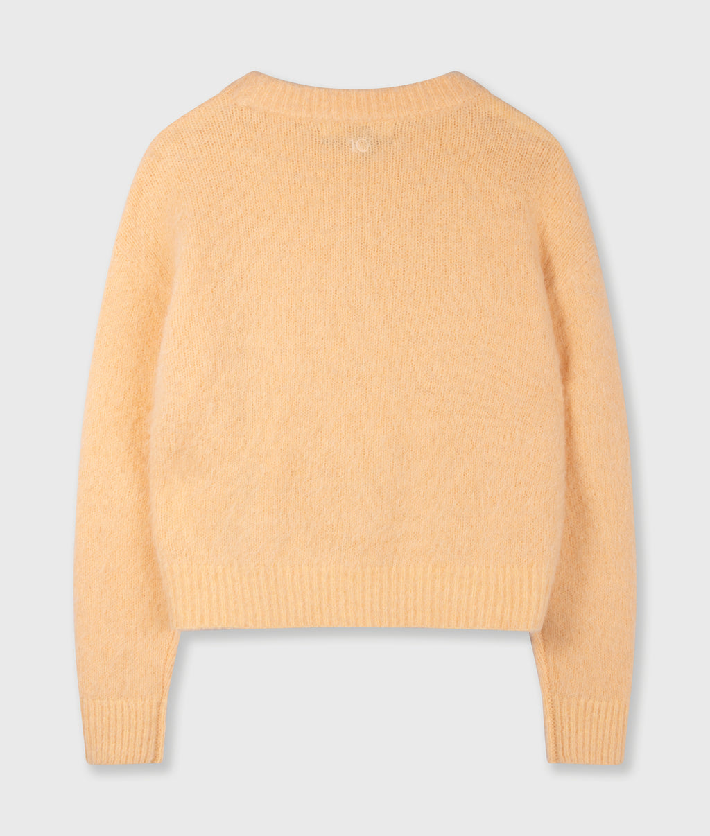 hairy gebreide trui | pastel mango