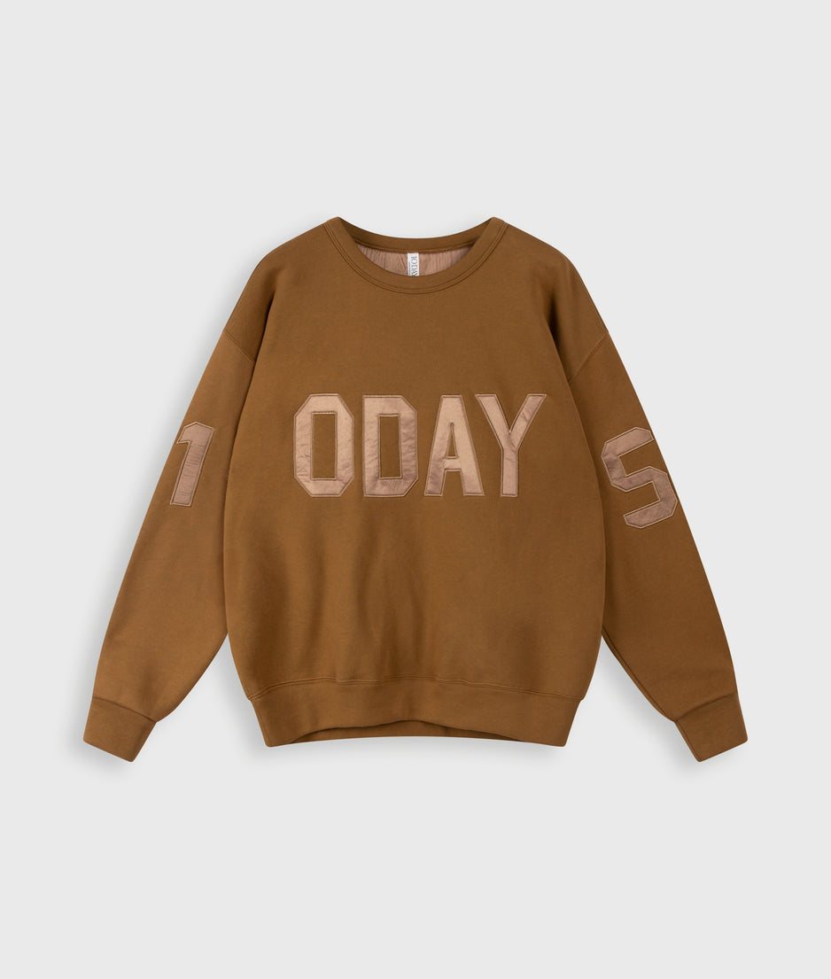 statement sweater logo | suede
