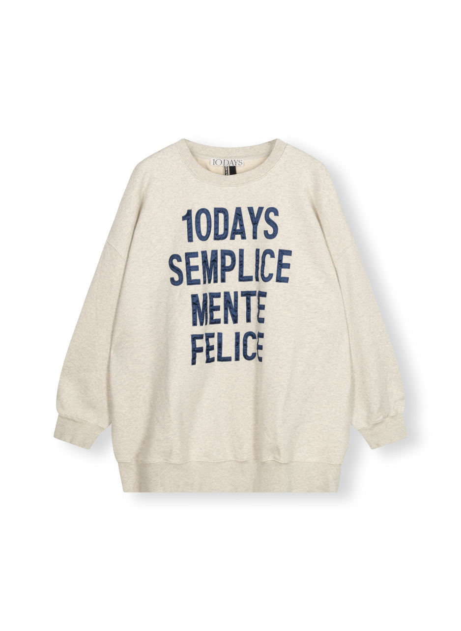 oversized statement sweater | soft white melee