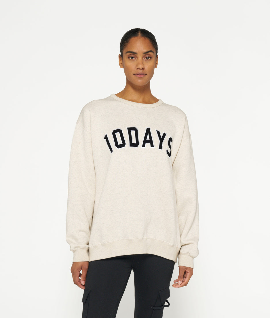 THE STATEMENT SWEATER | soft white melee