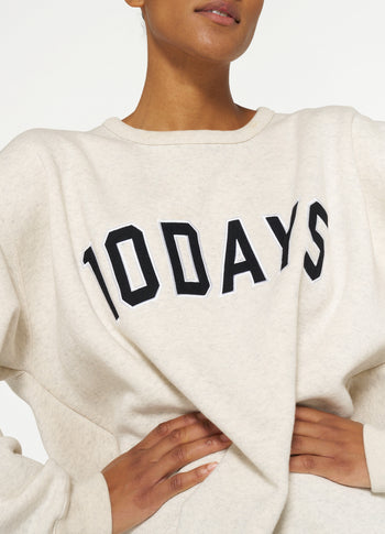 THE STATEMENT SWEATER | soft white melee