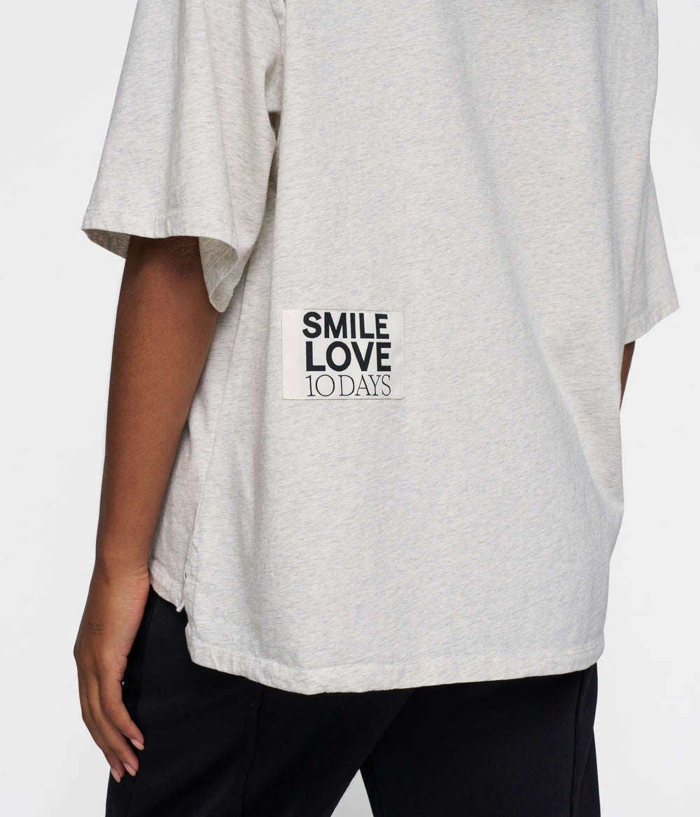 statement tee smile love | soft white melee
