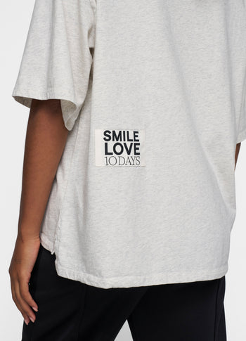 statement tee smile love | soft white melee