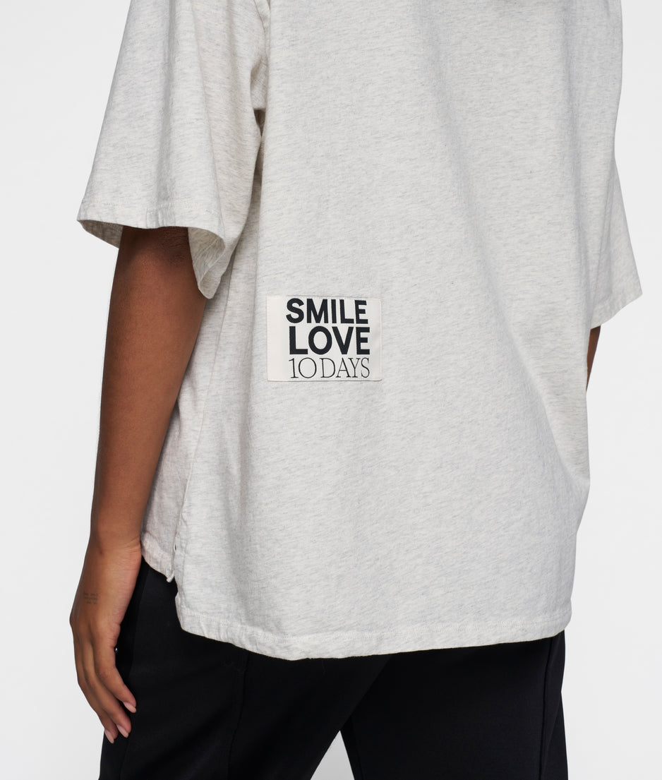 statement tee smile love | soft white melee