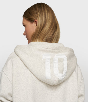 statement zip hoodie | soft white melee