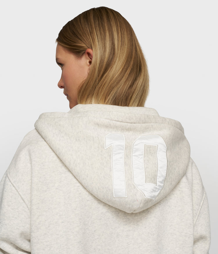 statement zip hoodie | soft white melee