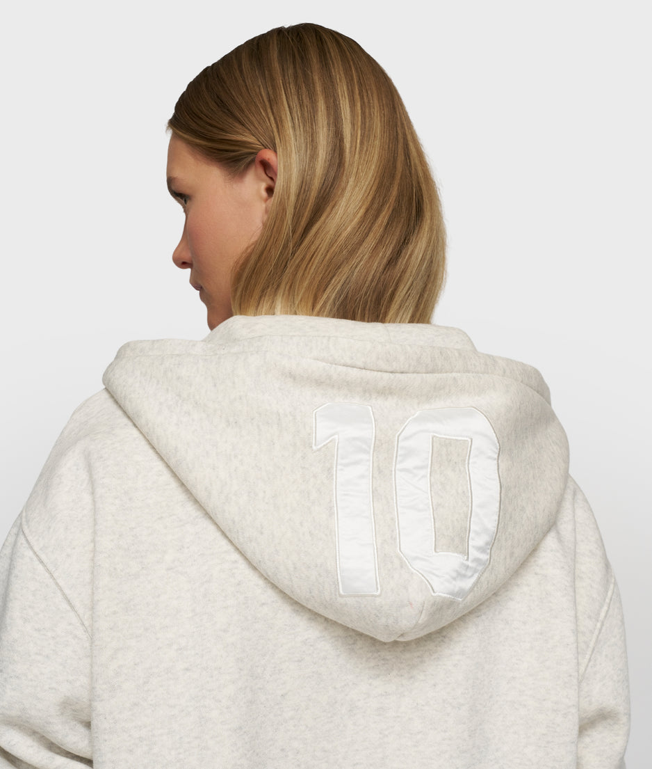 statement zip hoodie | soft white melee