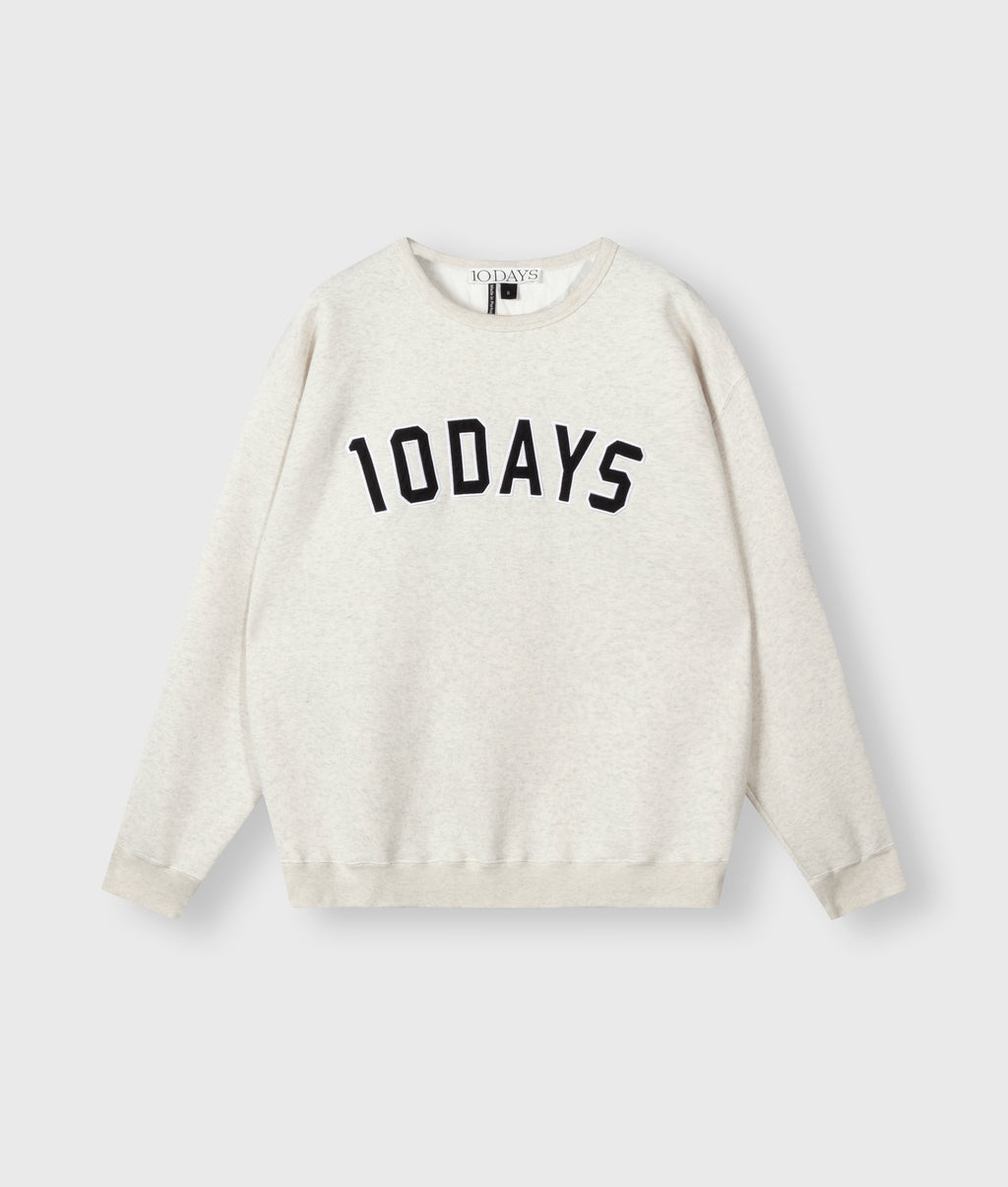 THE STATEMENT SWEATER | soft white melee