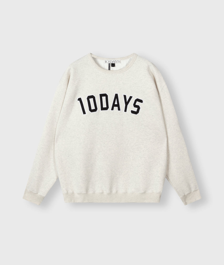 THE STATEMENT SWEATER | soft white melee