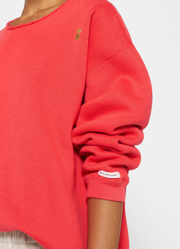 raw edge statement sweater | coral red