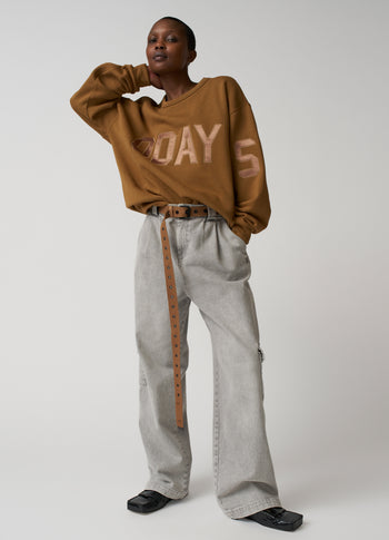 statement sweater logo | suede
