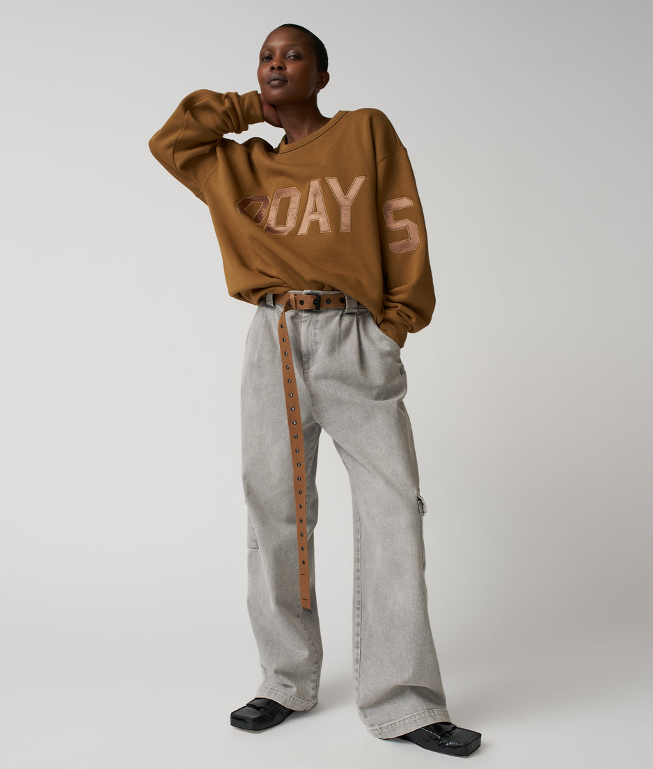 statement sweater logo | suede