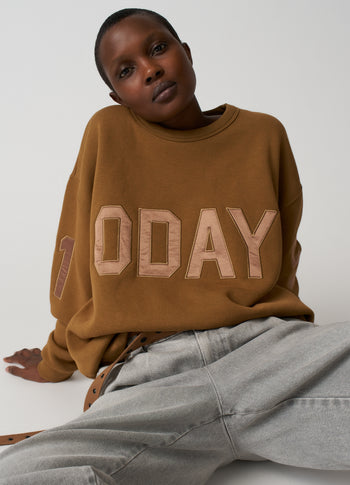 statement sweater logo | suede