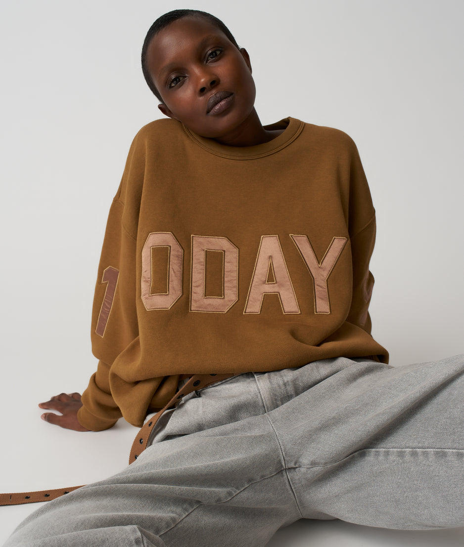 statement sweater logo | suede
