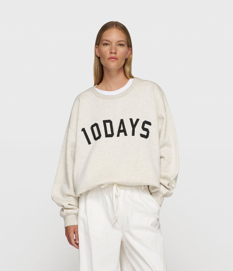 THE STATEMENT SWEATER | soft white melee
