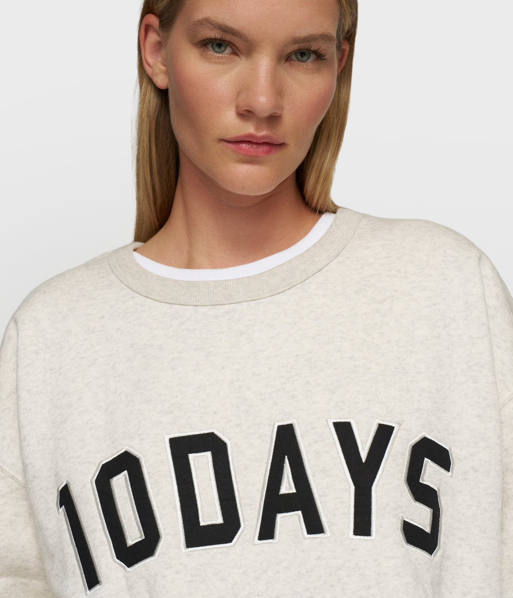 THE STATEMENT SWEATER | soft white melee