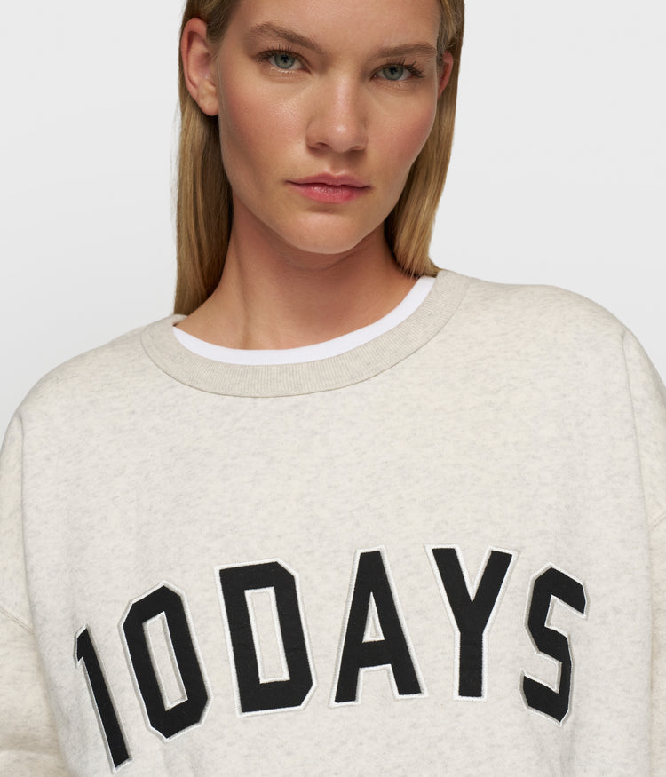 THE STATEMENT SWEATER | soft white melee