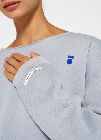 raw edge statement sweater | storm blue