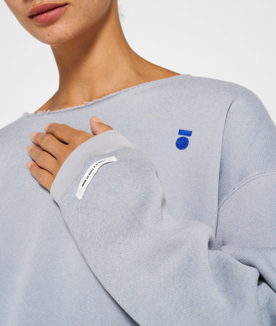raw edge statement sweater | storm blue