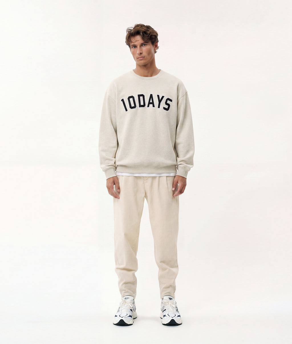 THE STATEMENT SWEATER | soft white melee